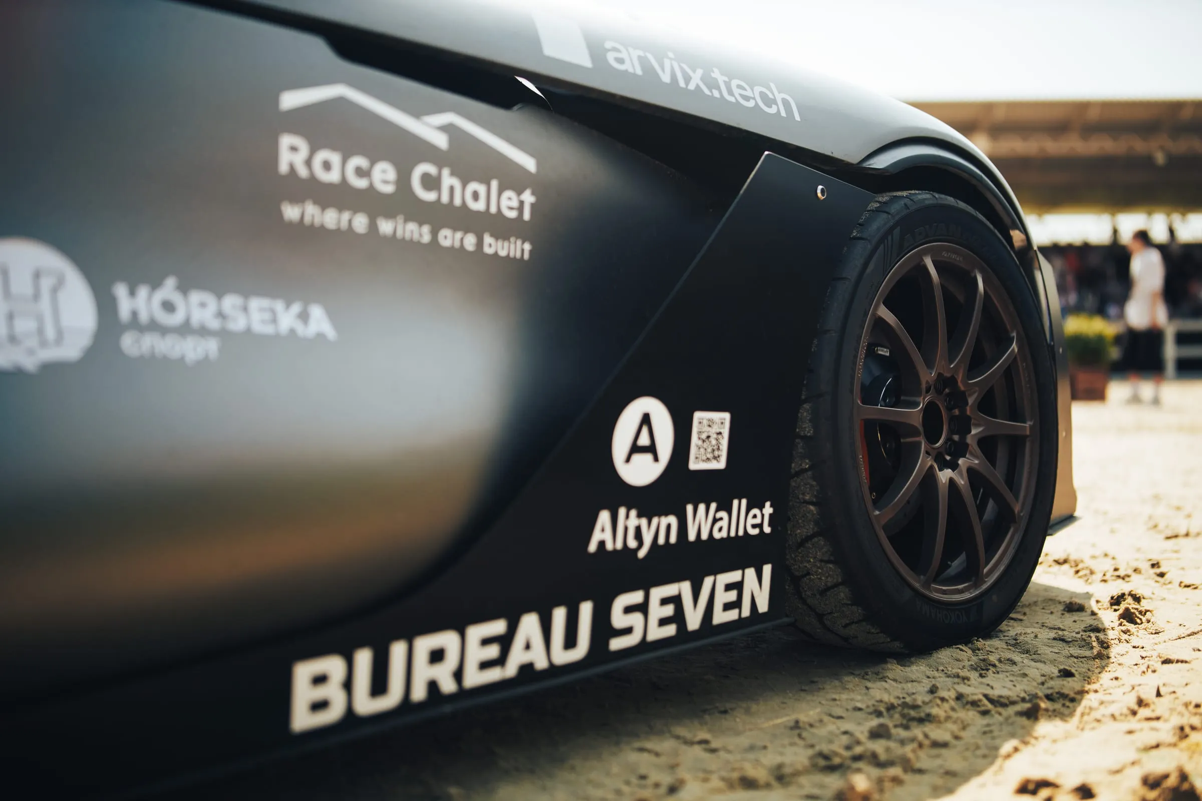 The prototype’s flank carrying partner marks and the Bureau Seven wordmark